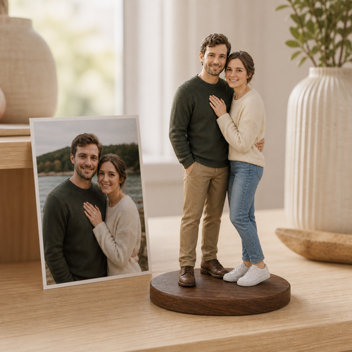 Full-colour 3D-printed resin couple figurines on a shared walnut base beside their source photo